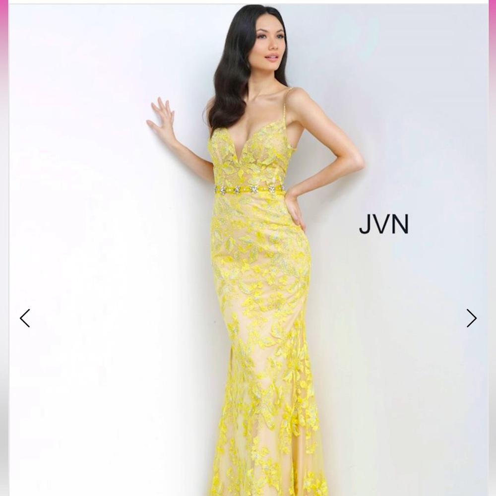 JVN by Jovani used once for a wedding. Beautiful yellow with embellishments